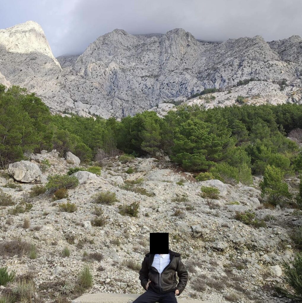 David Madali on assignment during a confidential strategic mission, face intentionally obscured for discretion